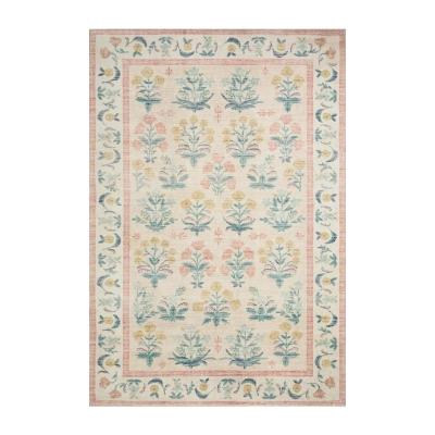 Pottery Barn Kids: Der Look zum kleinen Preis 40 Ein pinker und blauer Teppich mit floralen Designs, der eine günstige und stilvolle Alternative zum Pottery Barn Kids Blumenstrauß-Teppich darstellt.