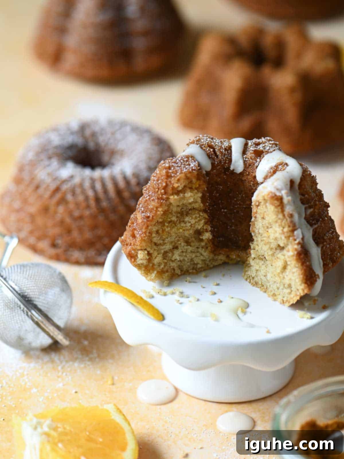 Delightful Mace Spiced Bundt Bites 8 A bundt cake sliced open showing the texture of the cake.