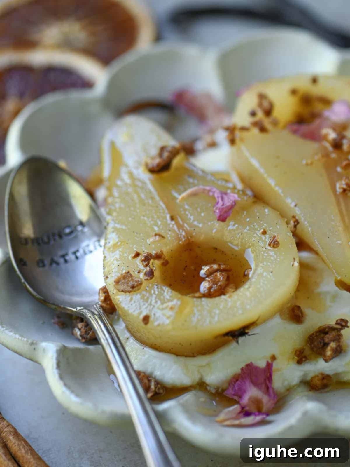 Velvet Vanilla Pears with Creamy Yogurt 6 Close-up of vanilla-poached pears with yogurt.