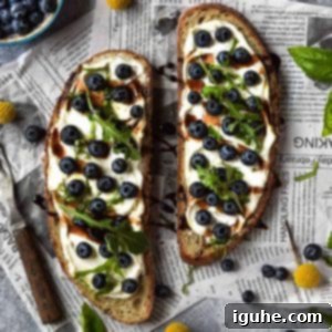 Blueberry Bliss Toast 10 Overhead view of blueberry toast on newspaper with yellow flowers around it