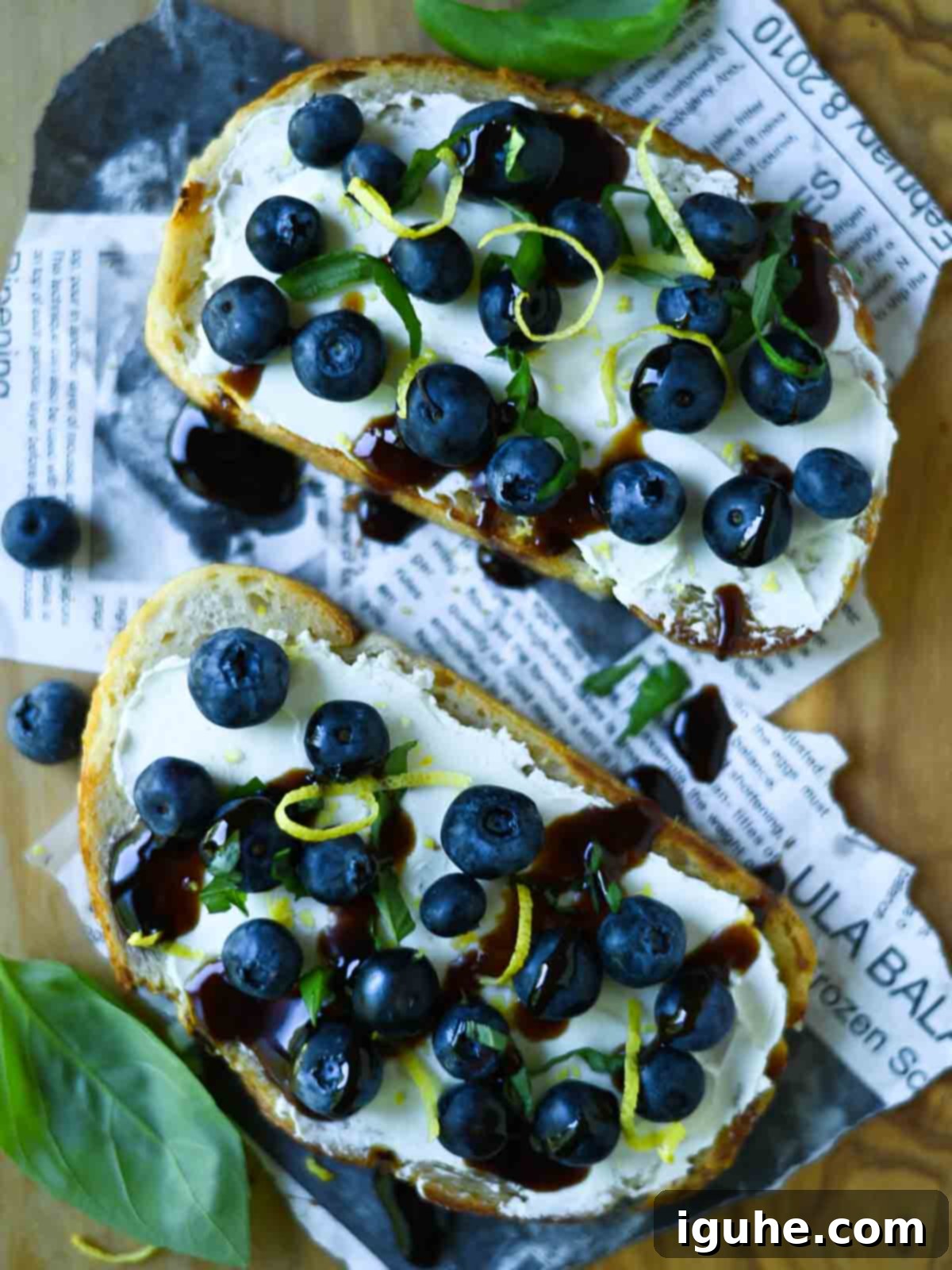 Blueberry Bliss Toast 8 Overview of blueberry toast on a cutting board.