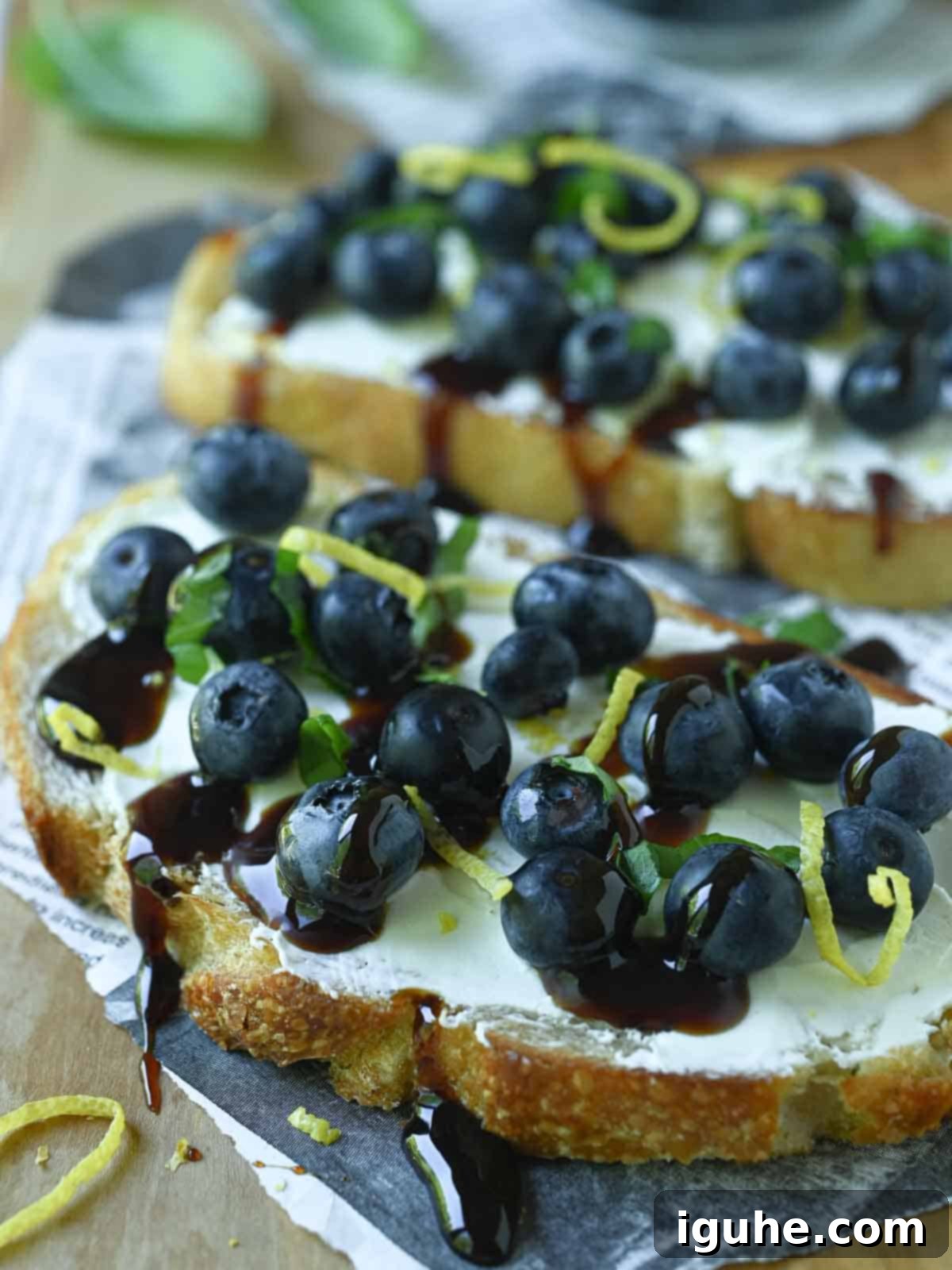 Blueberry Bliss Toast 9 Close-up on blueberry lemon toast on a cutting board.