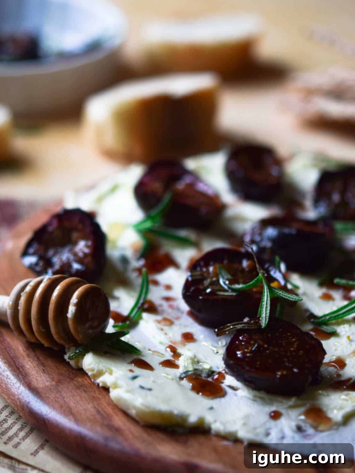 Aromatic Roasted Fig and Rosemary Butter Board 5 A close-up view of the butter board, highlighting the rich textures of the butter, roasted figs, and flaky sea salt.