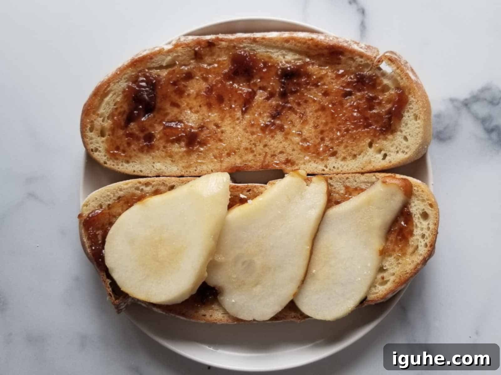 Sweet Pear and Pungent Gorgonzola Grilled Cheese 5 Cut pears on two slices of bread with fig jam.