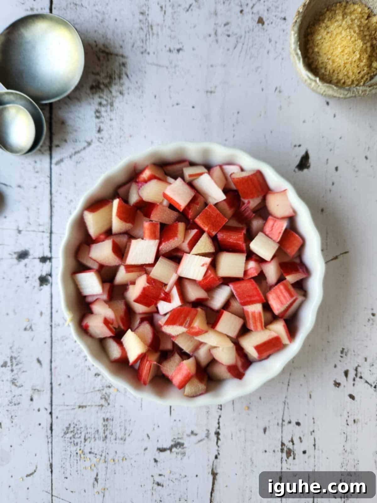Tangy Rhubarb Muffins 4 Diced rhubarb in a white dish.