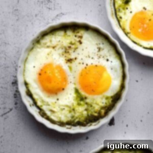 Pesto Egg Bake 9 Overhead view of baked eggs in ramekins with pesto,