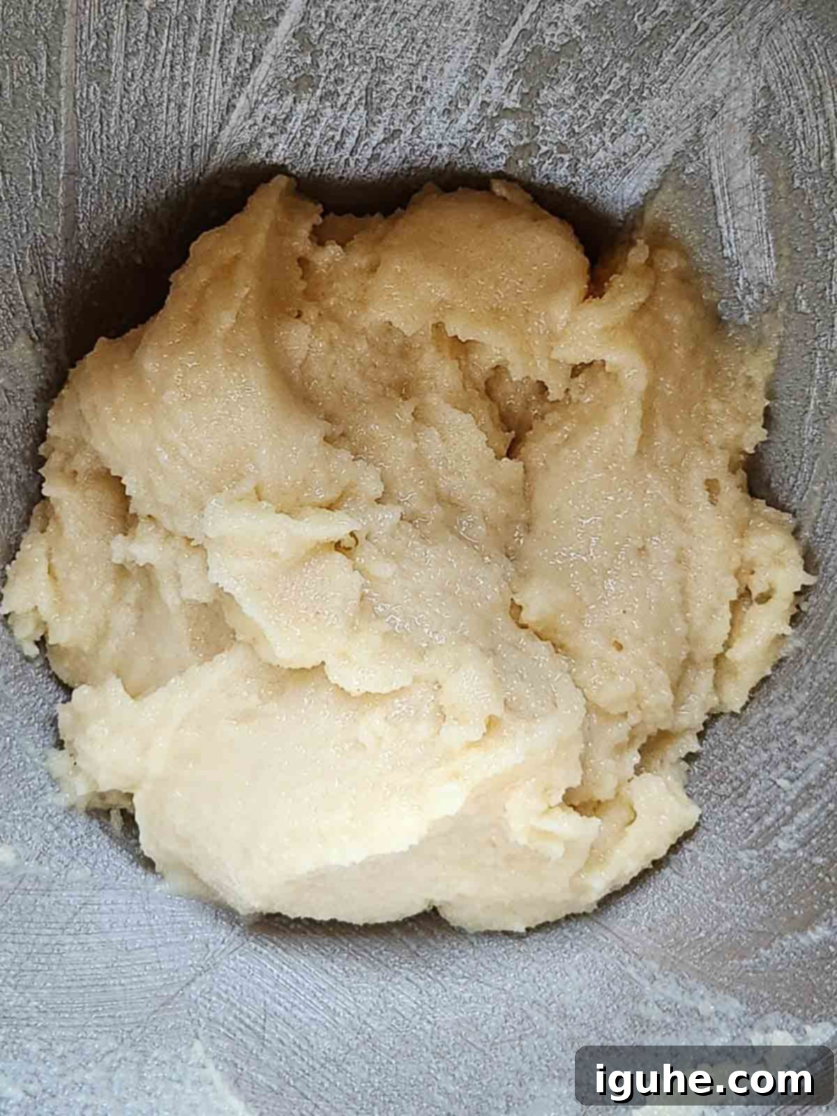 The Easiest Italian Pignoli Cookies 4 Batter for pignoli cookies in a metal bowl.
