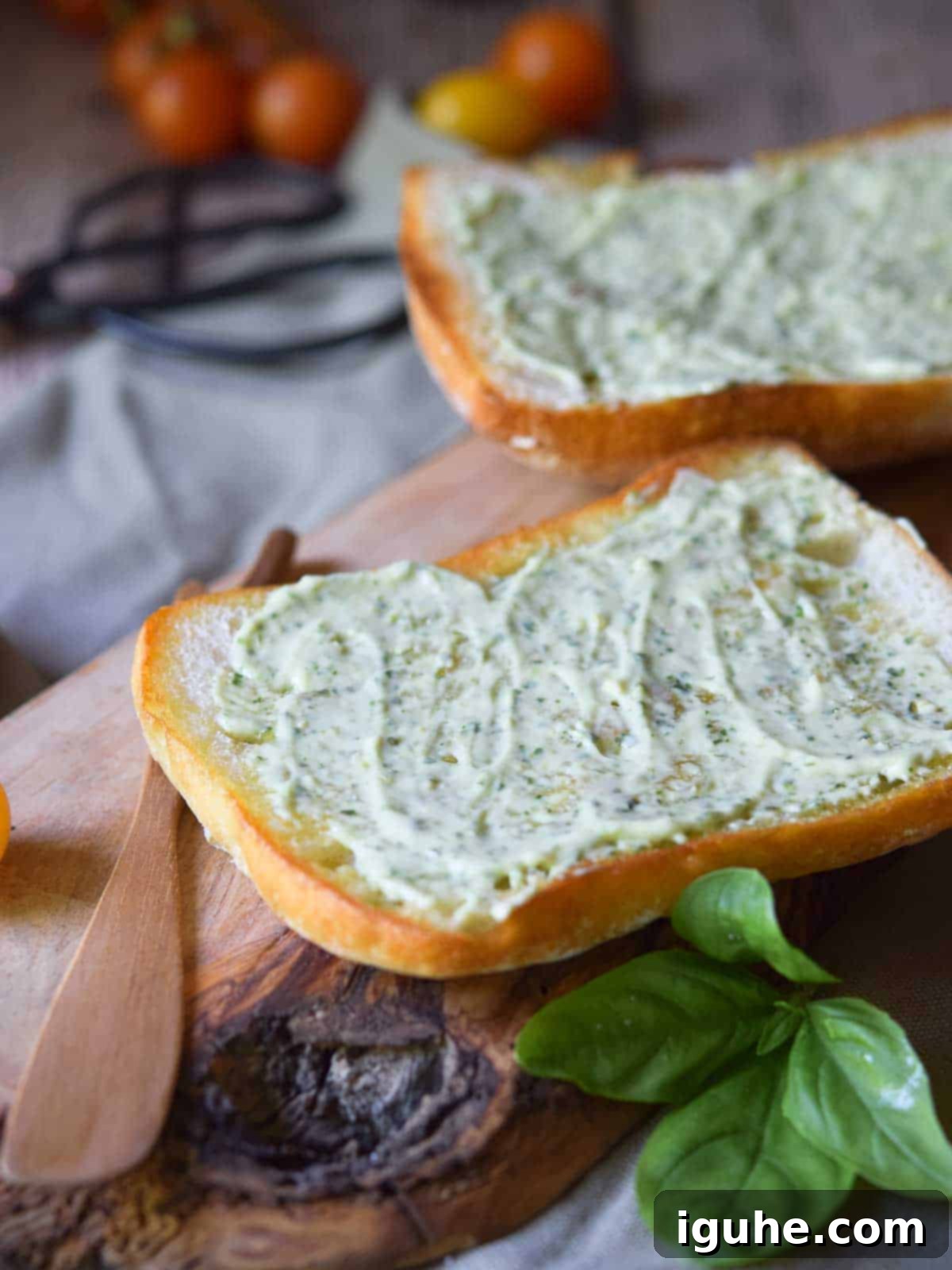 Sun-Kissed Heirloom Tomato & Pesto Aioli Sandwich 6 Two slices of bread with pesto aioli.