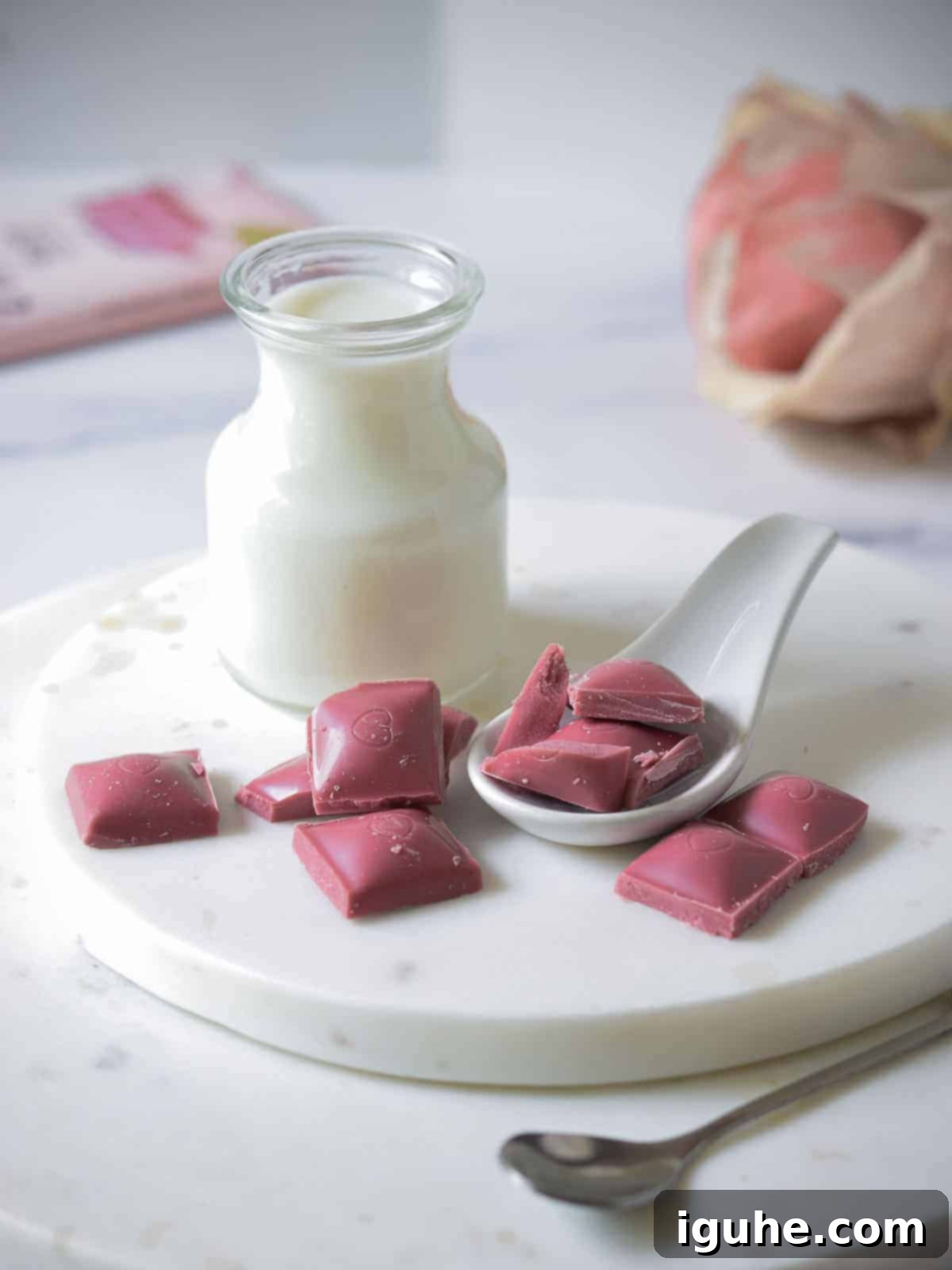 Velvet Ruby Hot Cocoa 4 Ruby chocolate bar ready to be chopped on a marble board.