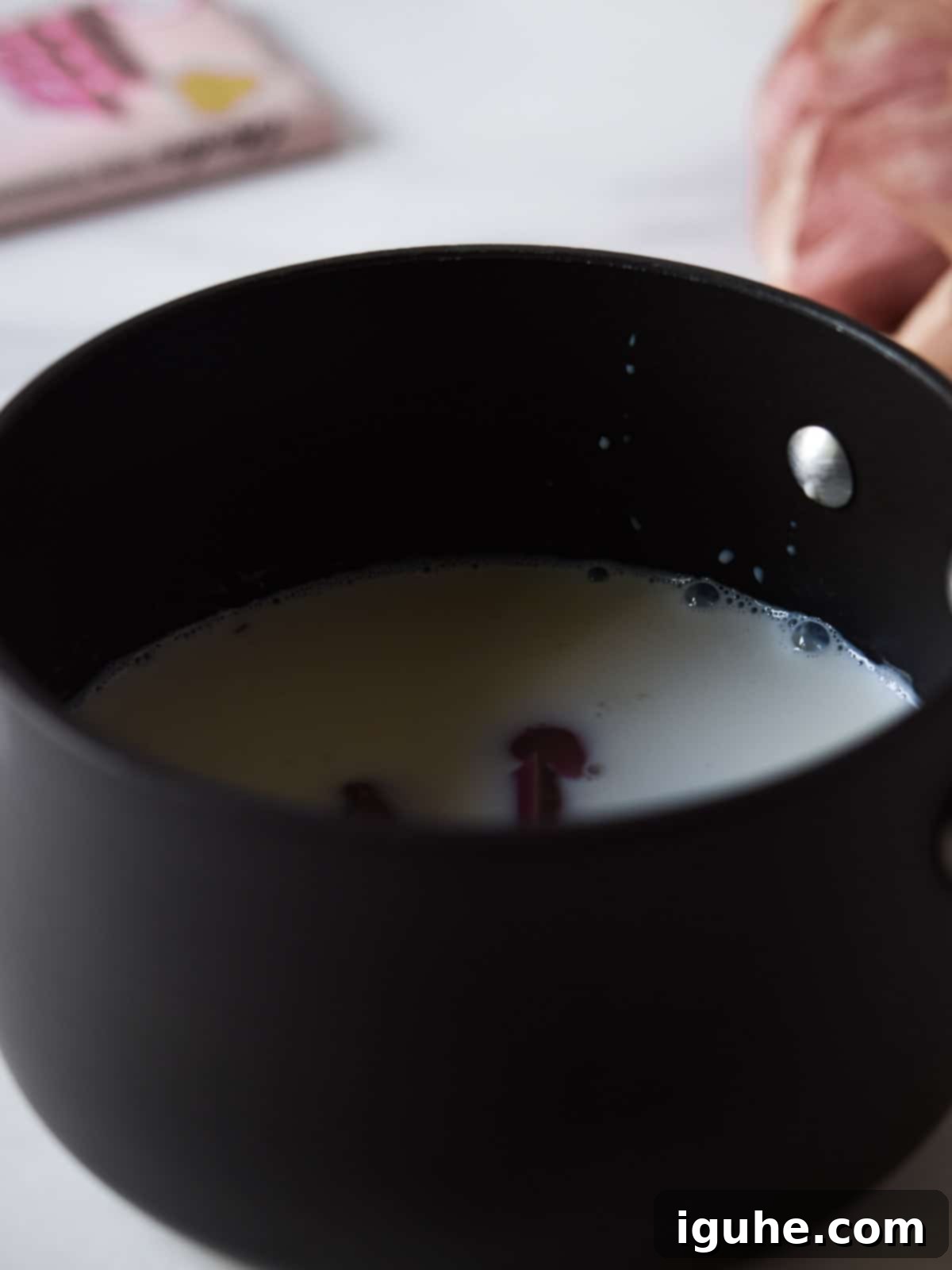 Velvet Ruby Hot Cocoa 5 Milk and chopped ruby chocolate in a small saucepan over heat.