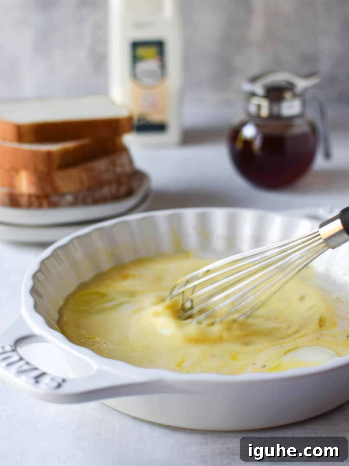Repurposed Buttermilk French Toast 5 Well-mixed French toast custard in a white shallow bowl.