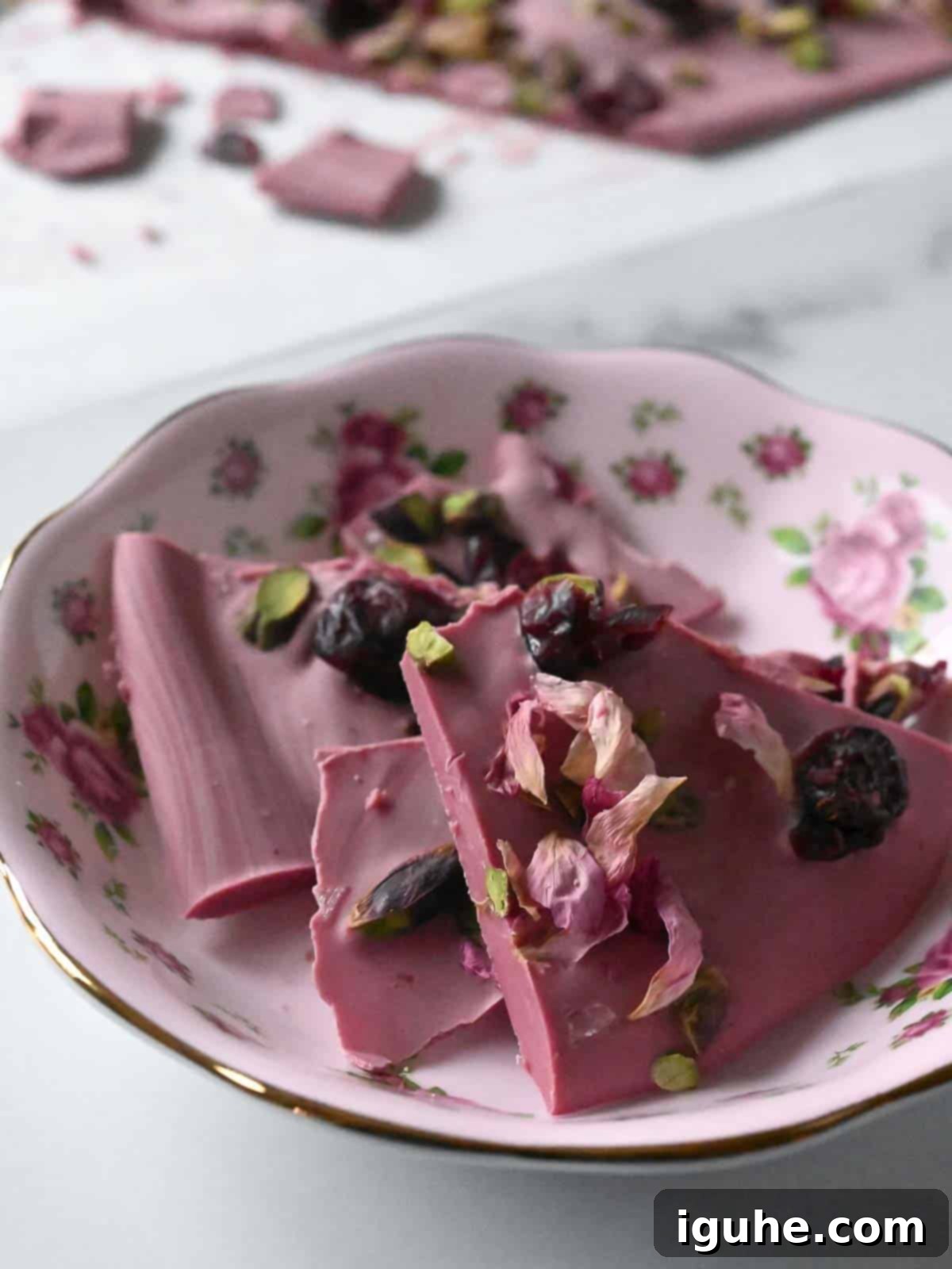 Blush Ruby Chocolate Bark 9 Ruby chocolate bark in a pick flower bowl.
