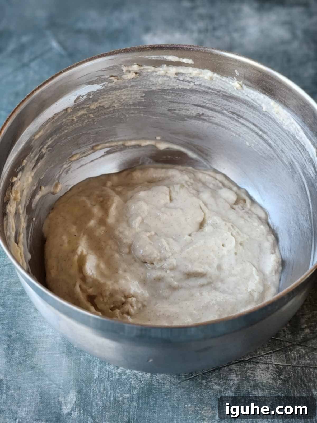 Cinnamon Swirl Sweet Cream Pancakes 5 Thick and lumpy final batter for sweet cream pancakes in a mixing bowl, ready for cooking.