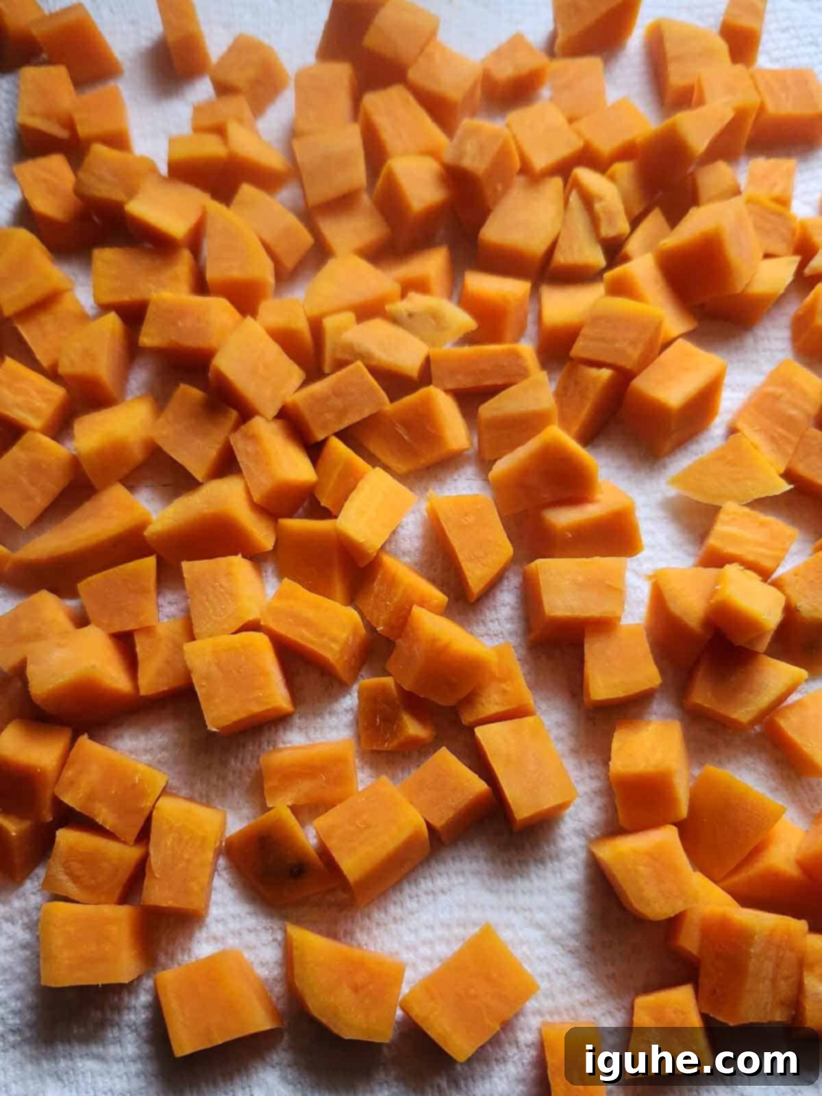 Sunrise Sweet Potato Bacon Medley 5 Sweet potato cubes drying on a paper towel.