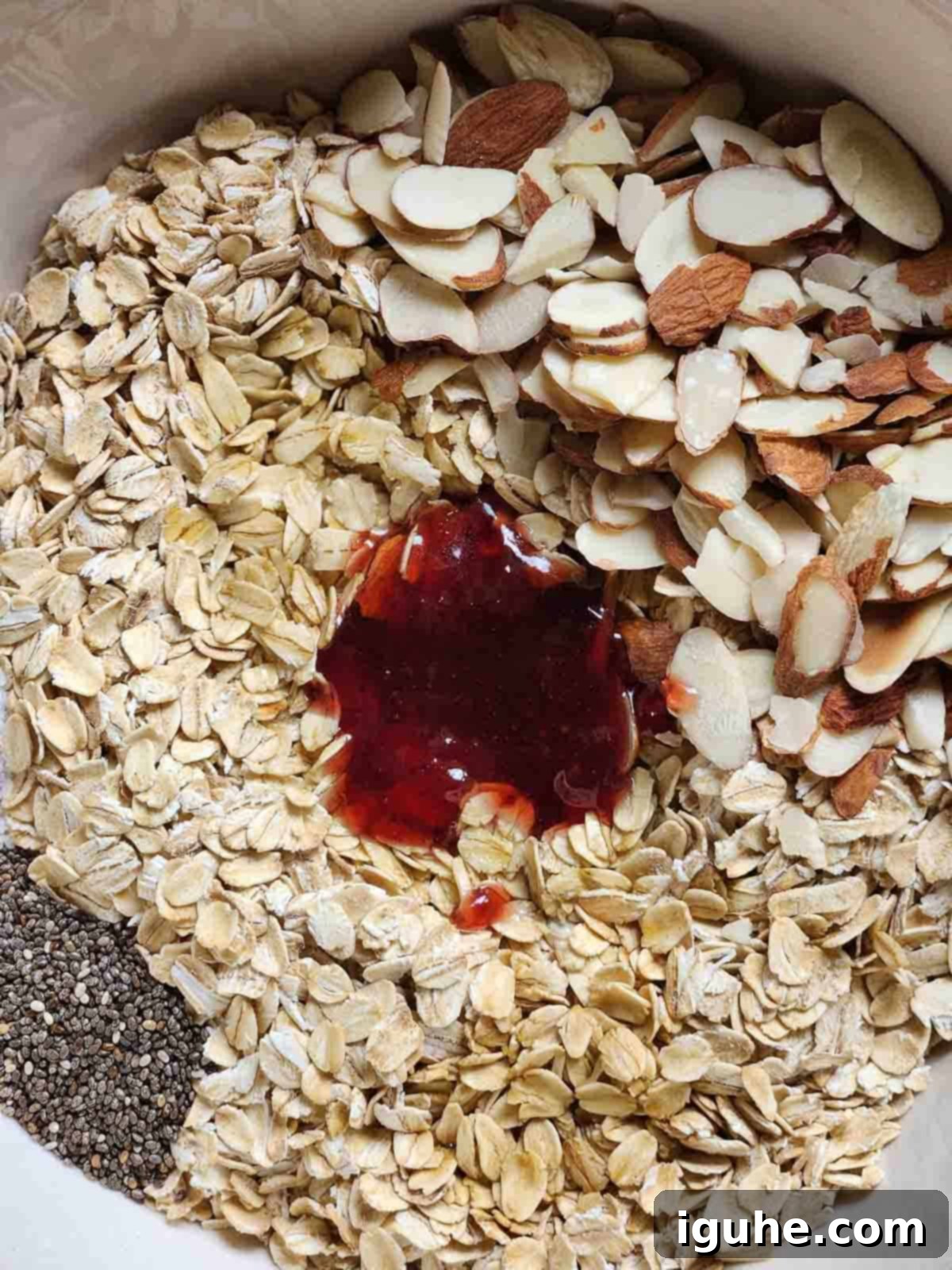 Berry Harvest Granola 4 Ingredients in a bowl for mixed berry granola.