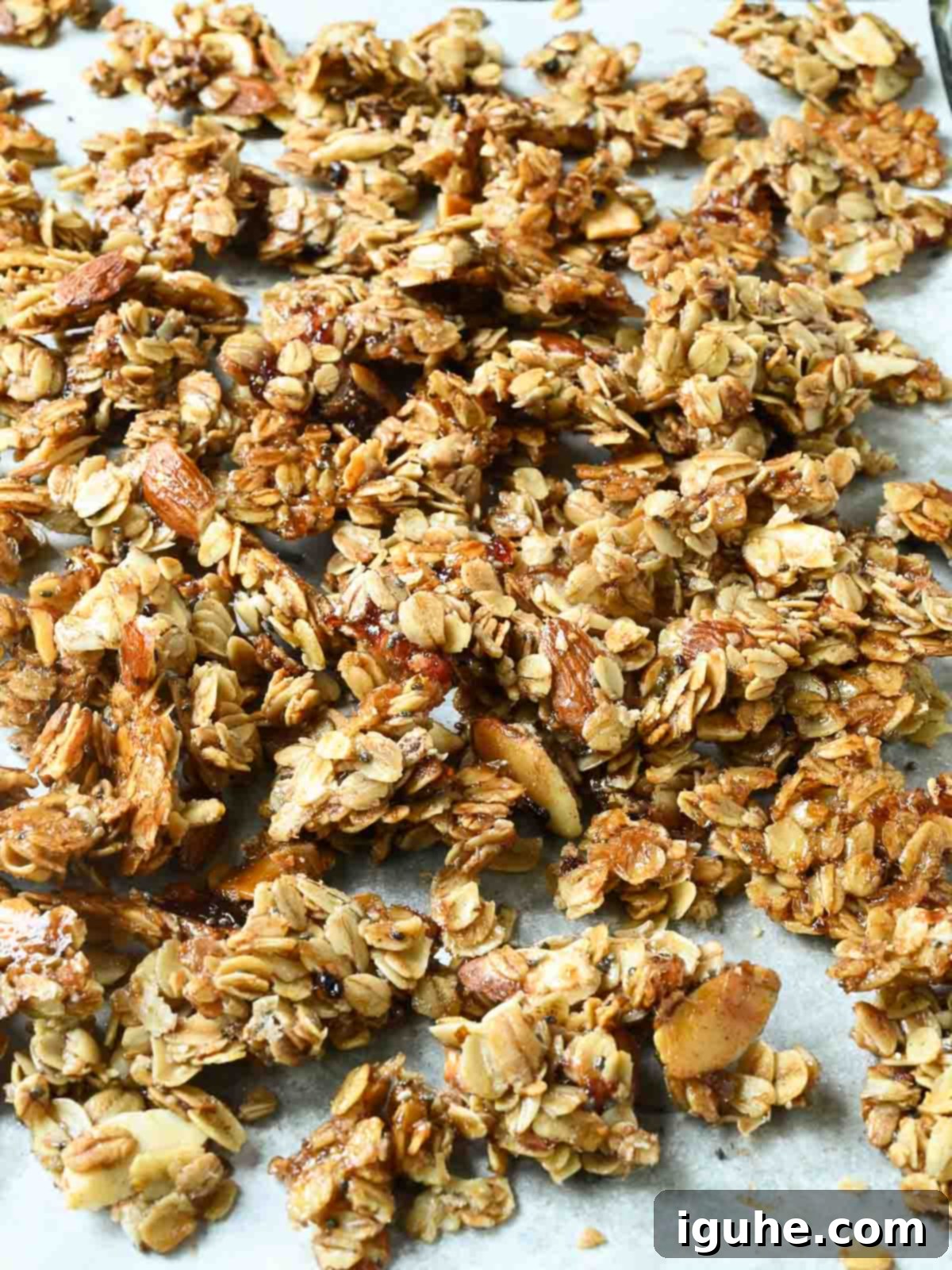 Berry Harvest Granola 6 Cooked granola on a baking sheet broken up into clusters.