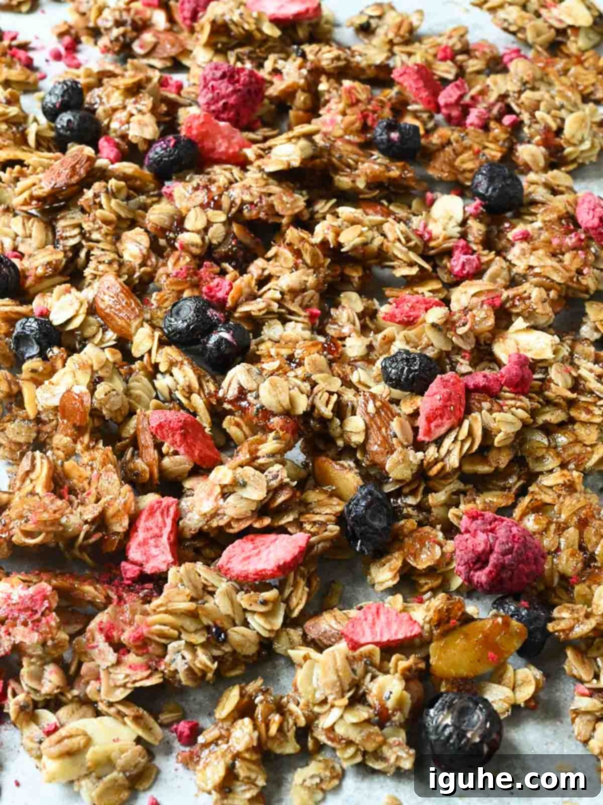 Berry Harvest Granola 7 Cooked mixed berry granola on a baking sheet.