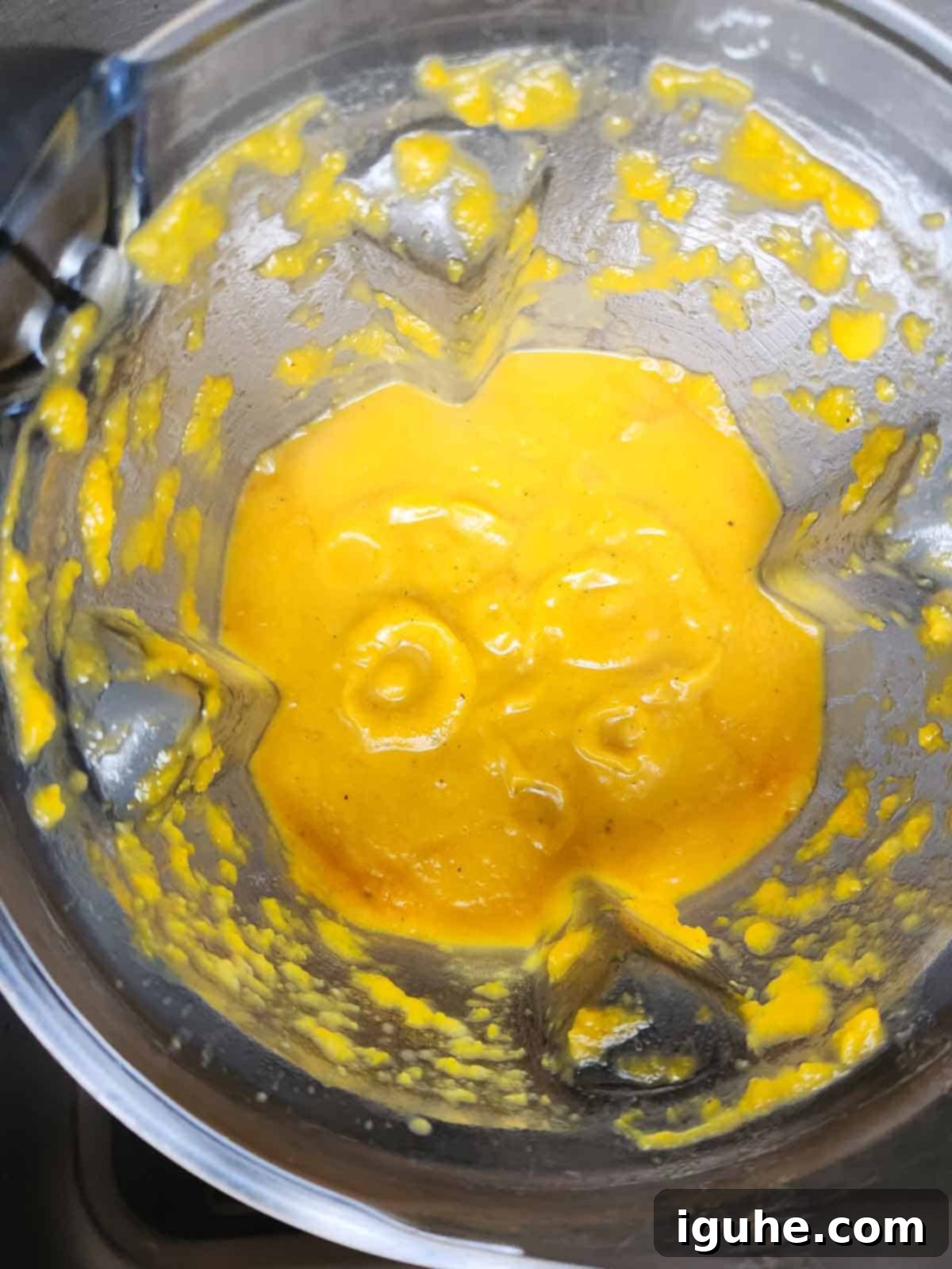 Golden Harvest Squash Soup 9 Smooth, pureed squash soup inside a high-powered blender, ready to be returned to the pot.