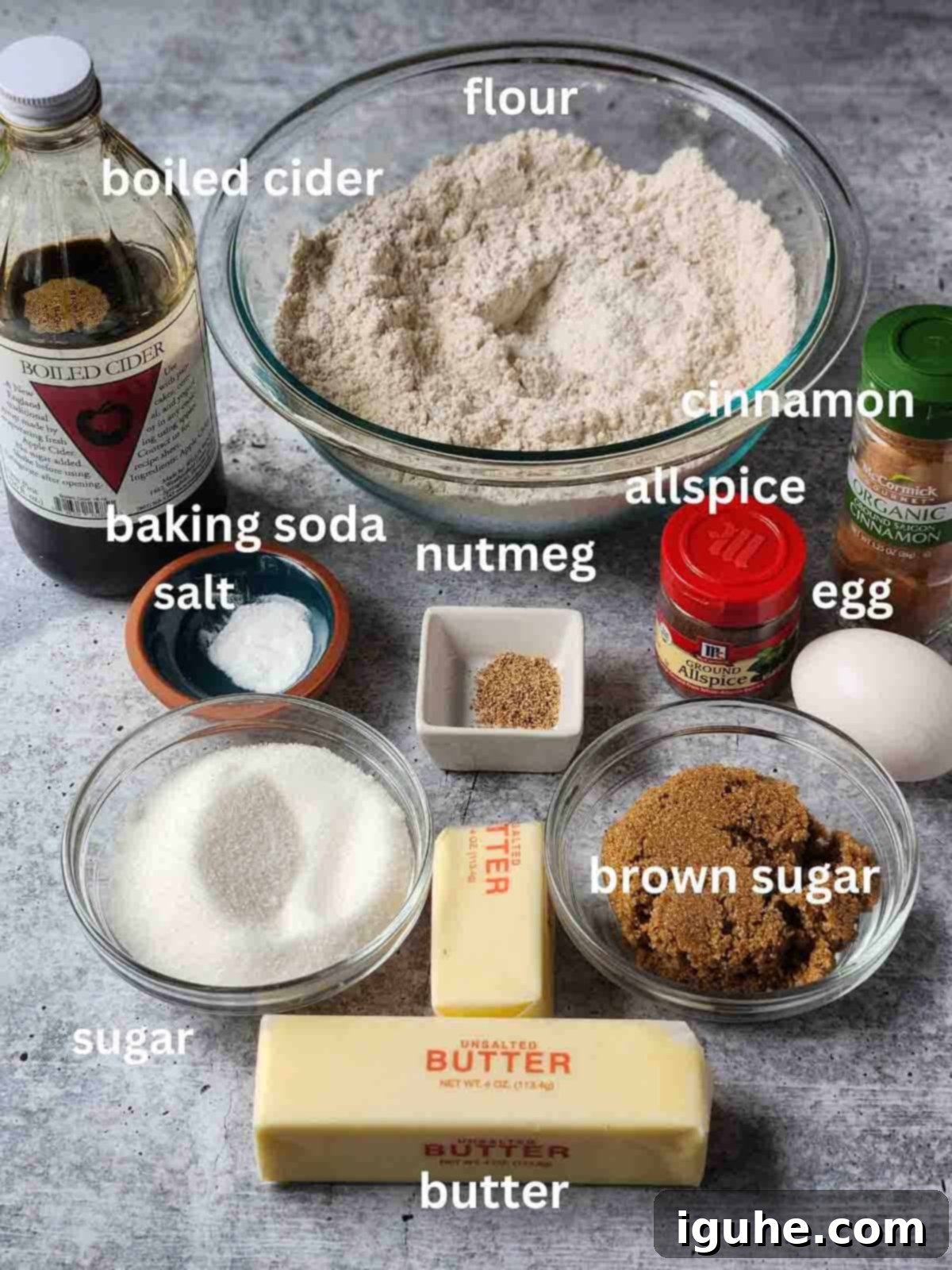 Orchard Spiced Cider Cookies 3 Ingredients for apple cider cookies an a grey surface.