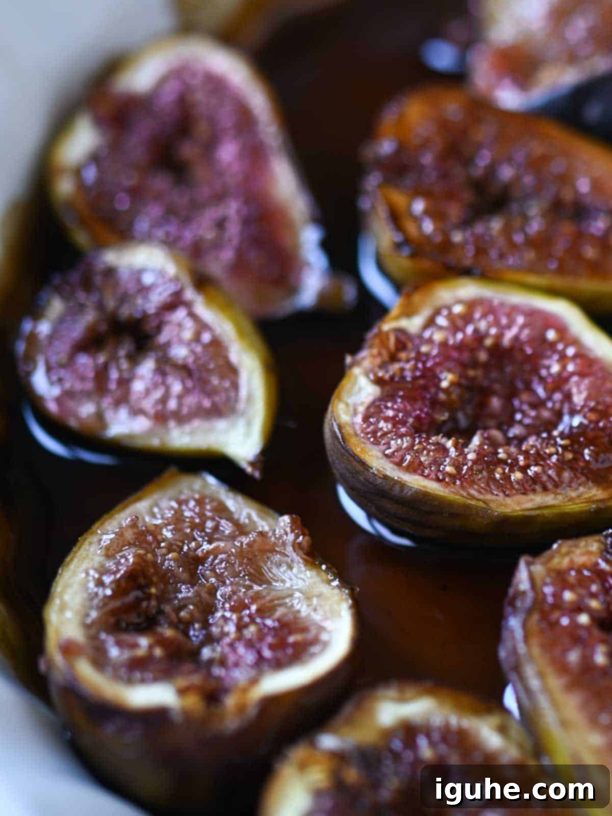 Sweet and Savory Balsamic Fig Toast 5 Balsamic roasted figs, tender and caramelized, cooling in a baking dish after roasting.