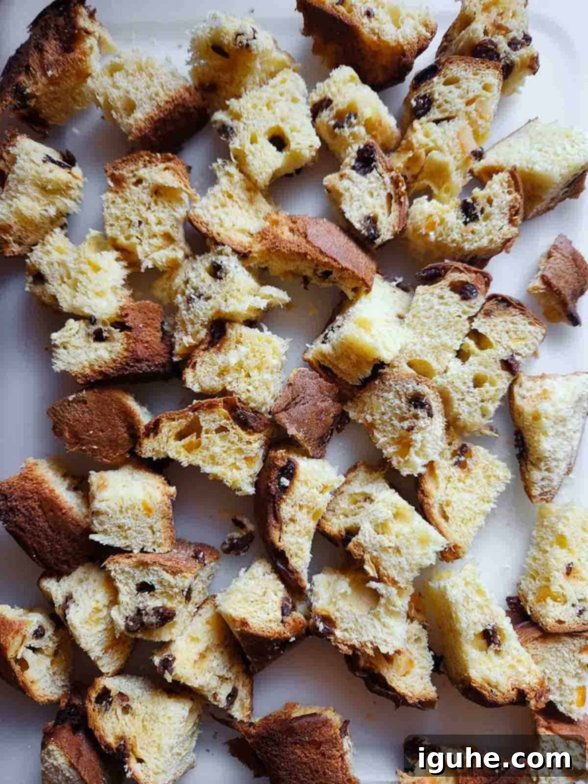 Italian Panettone Bread Pudding 4 Overhead view of cut up panettone bread.