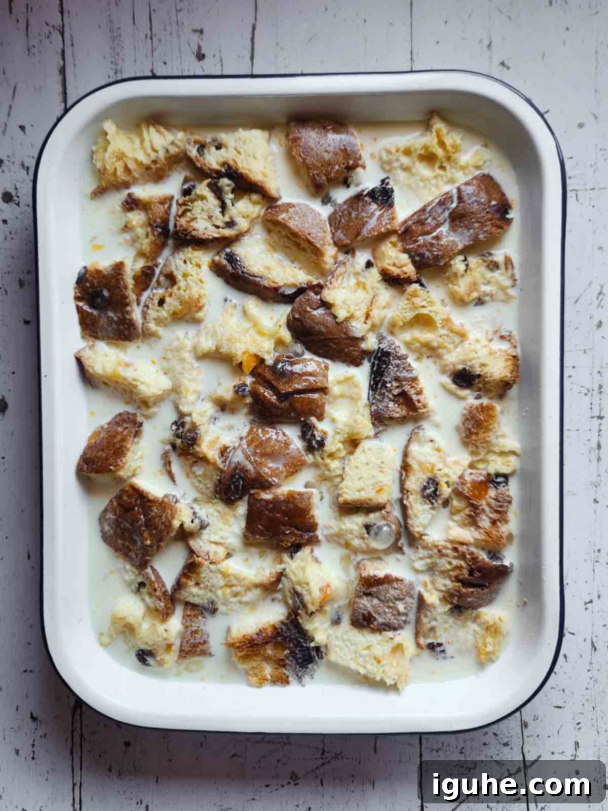 Italian Panettone Bread Pudding 7 Panettone bread pudding in a baking pan before being cooked.