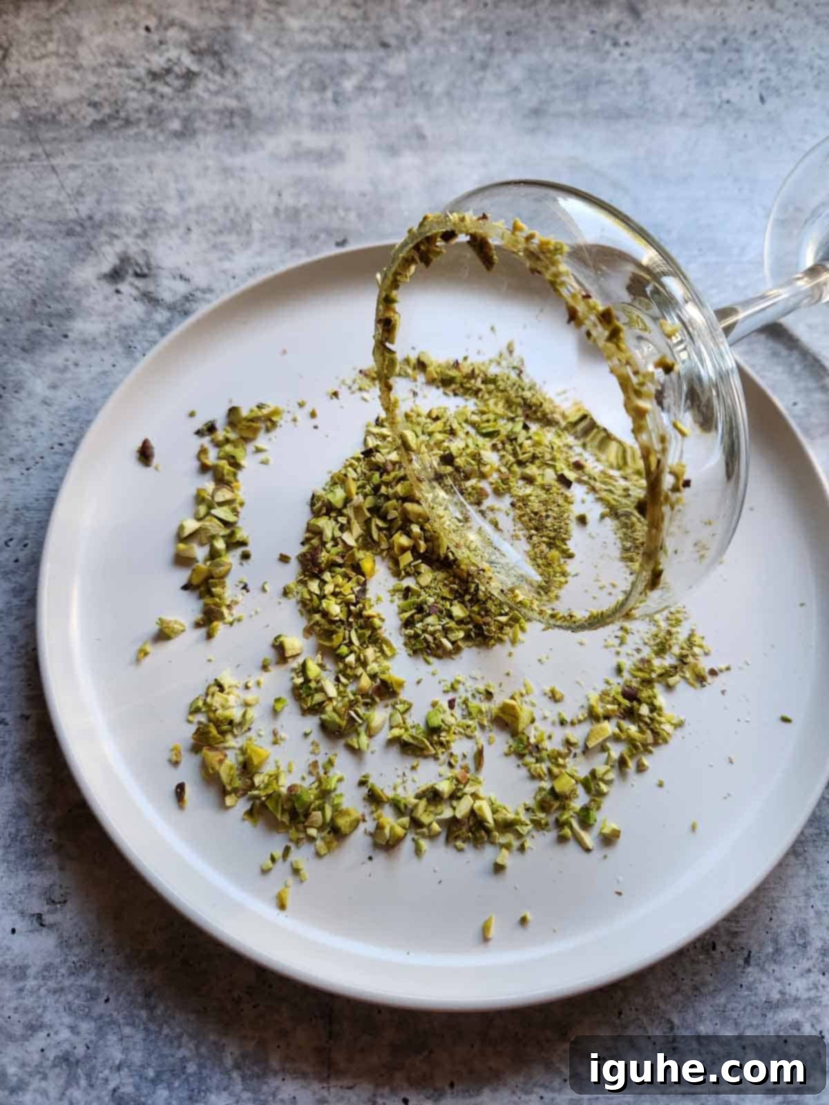 Velvet White Chocolate Pistachio Martini 6 Martini glass dipped in crushed pistachios.
