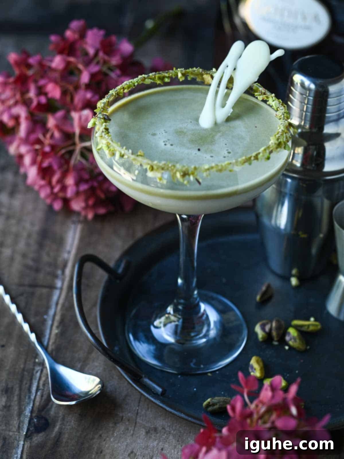Velvet White Chocolate Pistachio Martini 9 Pistachio and white chocolate martini on a tray.