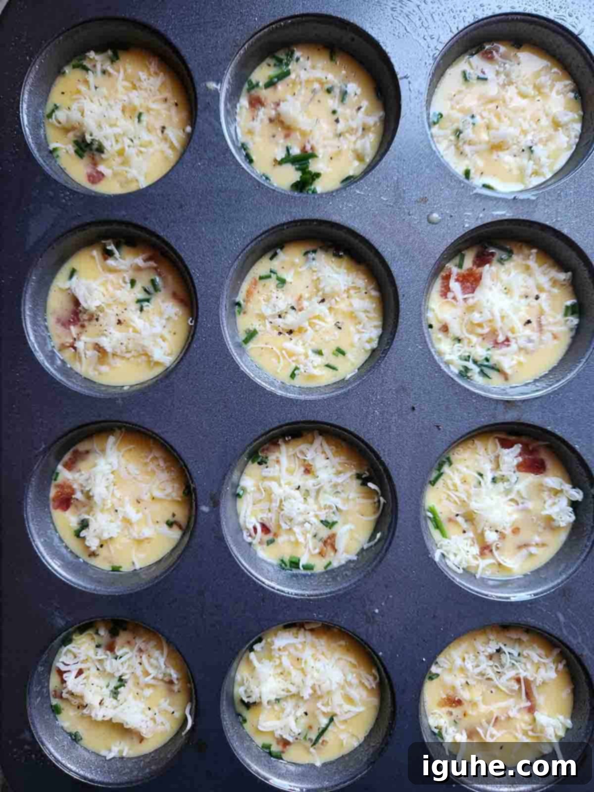 Bacon Buttermilk Egg Bites 7 Egg bite batter in a muffin tin.