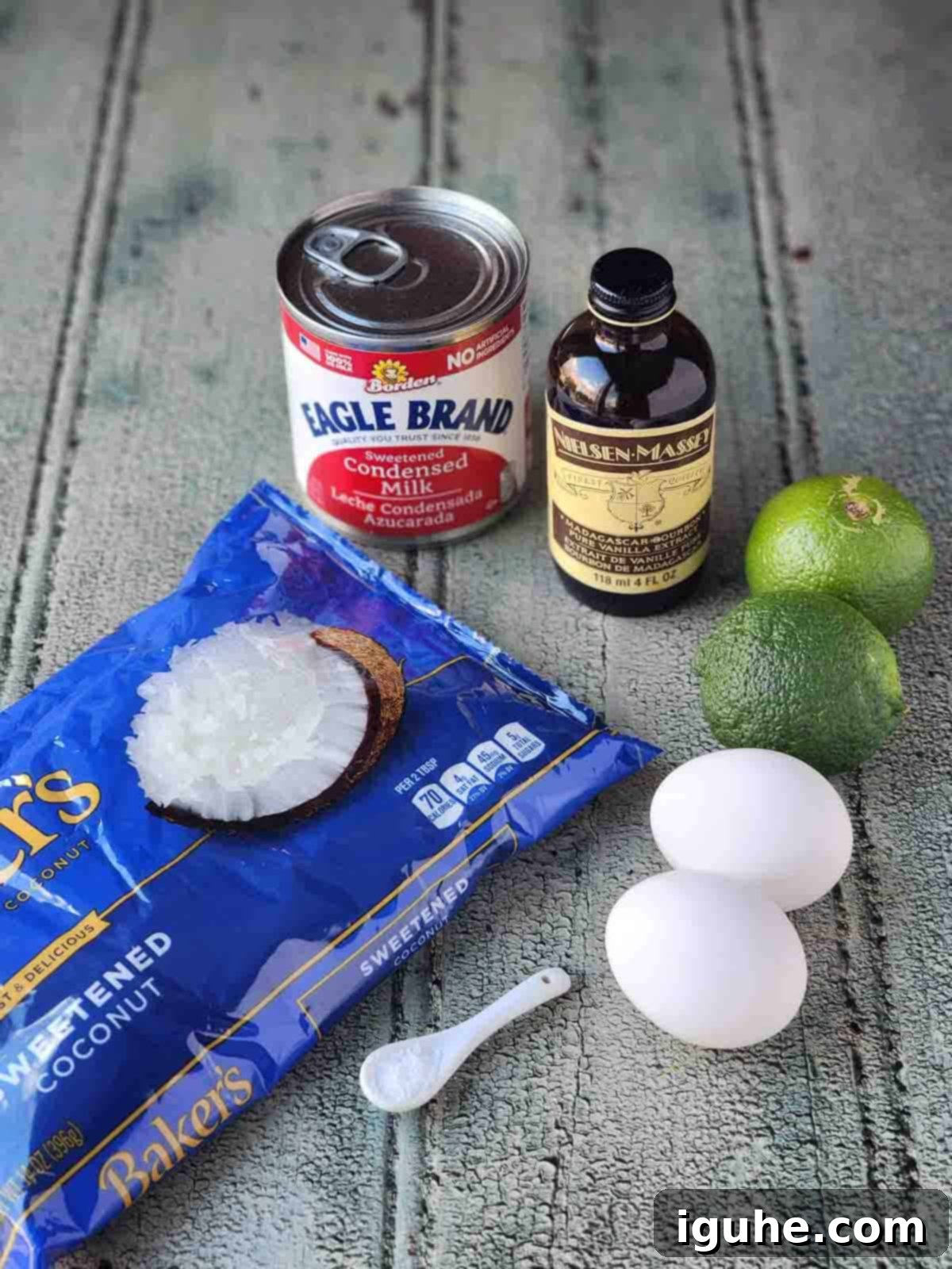 Tropical Coconut Lime Macaroons 3 Ingredients for coconut lime macaroons laid out on a clean surface.