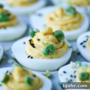 Umami Deviled Eggs 13 Close up of wasabi topped deviled eggs.