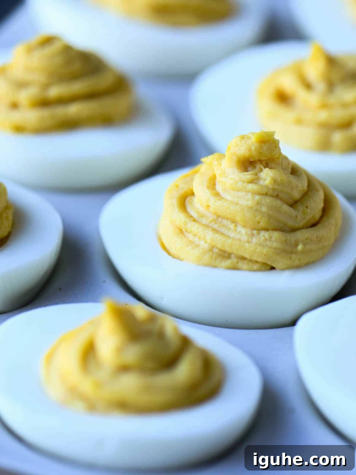 Umami Deviled Eggs 10 Close up of deviled eggs.