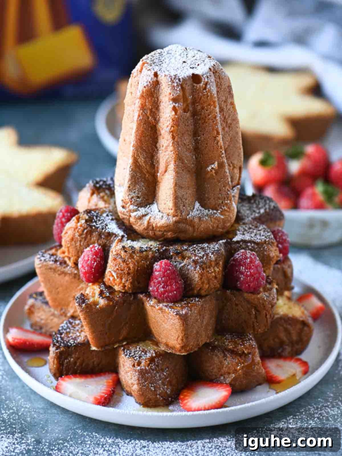 A stack of pandoro French toast arranged like a Christmas tree.