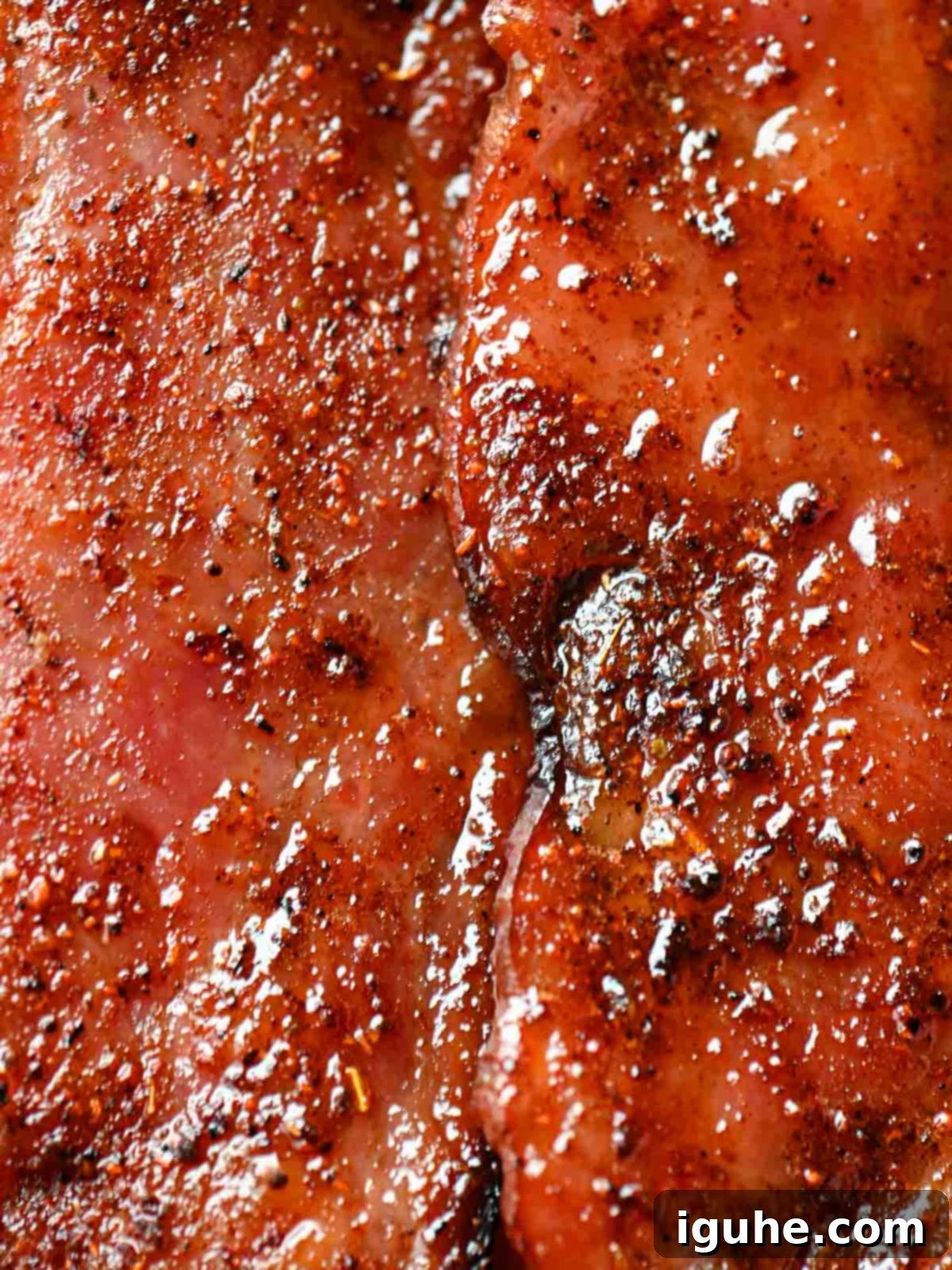Honey Chipotle Turkey Bacon Bliss 8 Close-up of caramelized honey chipotle turkey bacon with a glossy glaze, ready to be served and enjoyed.