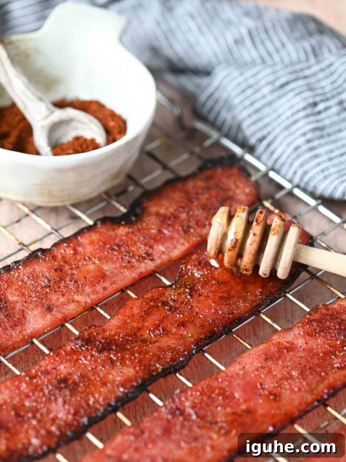 Honey Chipotle Turkey Bacon Bliss 9 Turkey bacon on a rack, drizzled with honey, showcasing the key ingredient for this delicious recipe.
