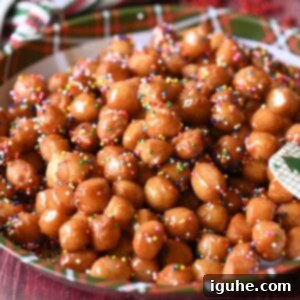 Honey-Drizzled Italian Dough Balls 10 Golden Italian honey balls arranged artfully on a Christmas plate.